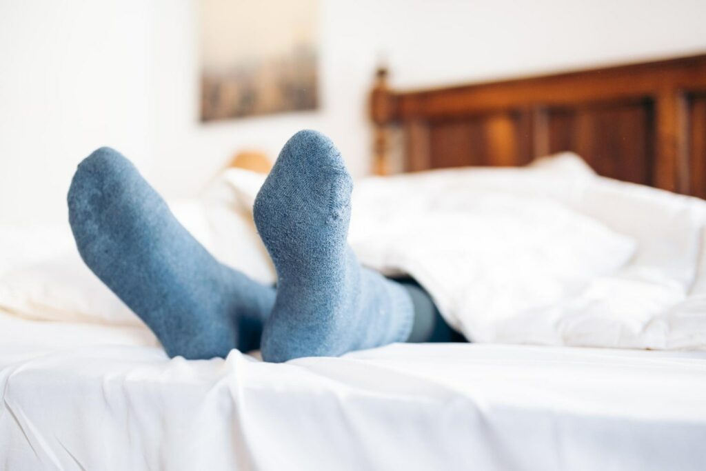 Sleeping with Socks on: The Pros & Cons of Wearing Socks to Sleep